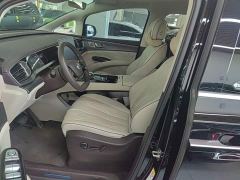 Denza D9 DM-i 980 AWD Luxury - ფოტო 14