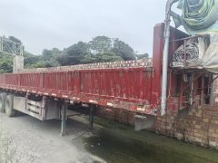 13 m x 2.55 m 3-axle low flatbed semi-trailer - photo 1